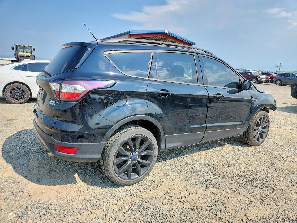 Photo 3 from auction – 2017 FORD ESCAPE with VIN 1FMCU9J92HUD96970