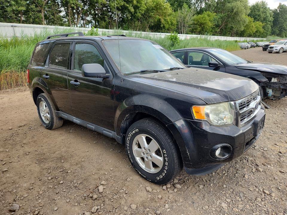 Photo 4 from auction – 2011 FORD ESCAPE with VIN 1FMCU0DG7BKB27176
