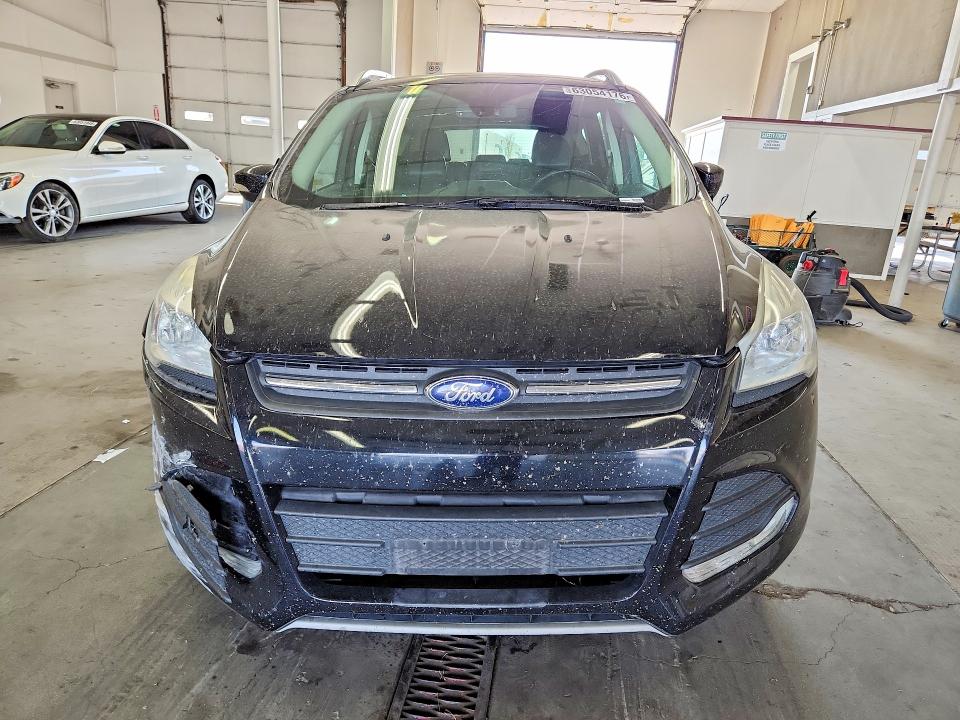 Photo 5 from auction – 2016 FORD ESCAPE with VIN 1FMCU9J90GUC44636