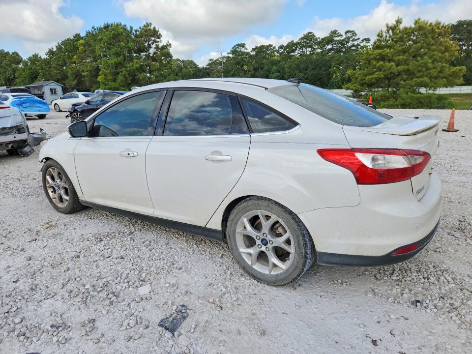 Photo 2 from auction – 2014 FORD FOCUS with VIN 1FADP3J21EL349100