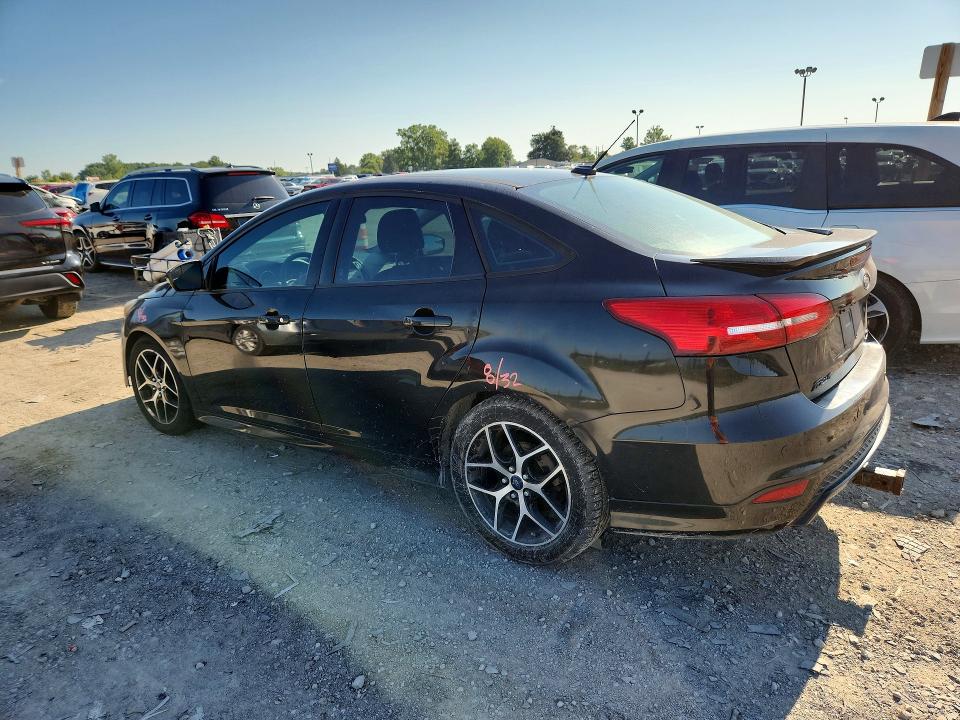 Photo 2 from auction – 2015 FORD FOCUS with VIN 1FADP3F24FL340627