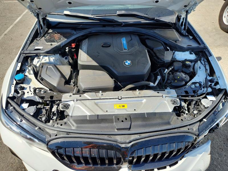 Photo 11 from auction – 2022 BMW 330E with VIN 3MW5P7J05N8C52264