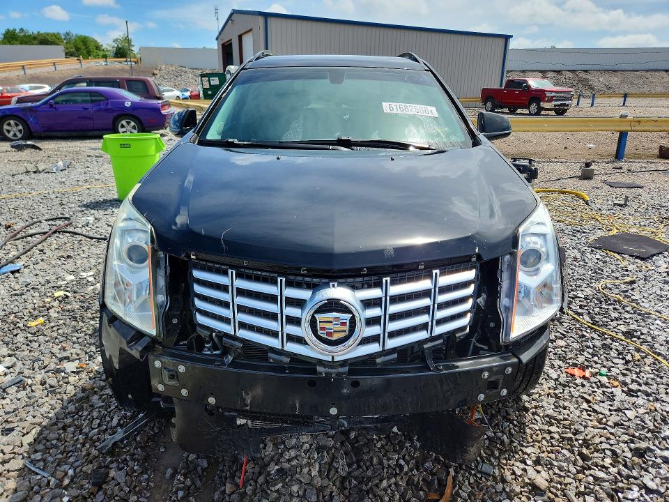 Photo 5 from auction – 2015 CADILLAC SRX with VIN 3GYFNAE39FS519841