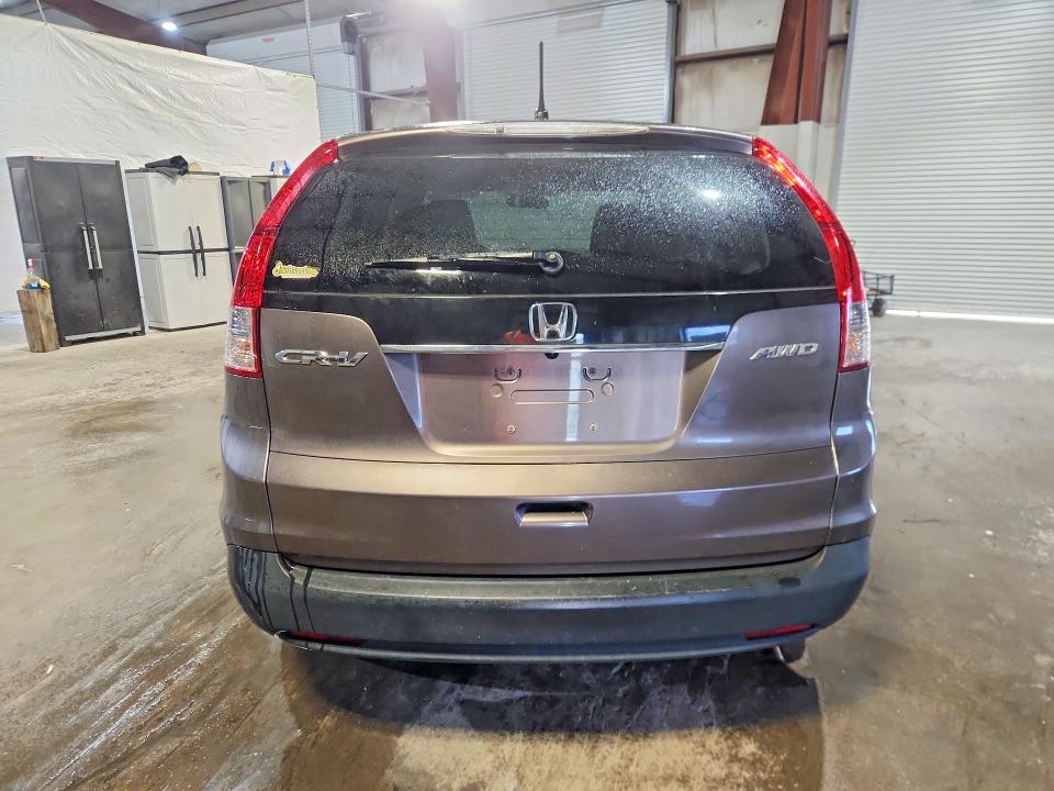 Photo 6 from auction – 2012 HONDA CR-V with VIN 5J6RM4H55CL000673