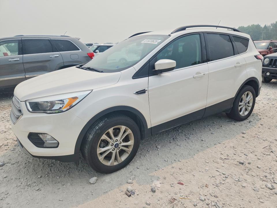 FORD ESCAPE 2018 with VIN 1FMCU9GD7JUC86062 - Photo from auction