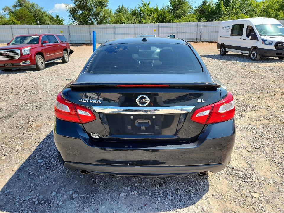 Photo 6 from auction – 2016 NISSAN ALTIMA with VIN 1N4AL3AP7GC253341