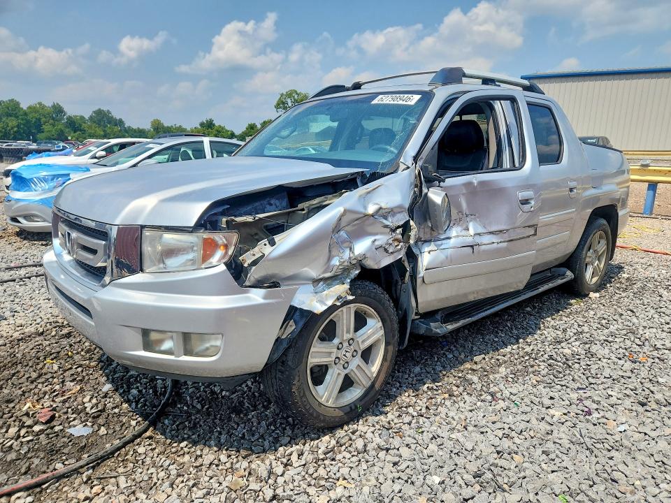 HONDA RIDGELINE 2011 with VIN 5FPYK1F50BB007273 - Photo from auction