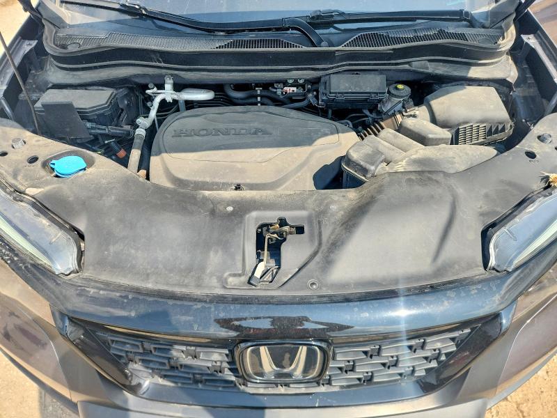 Photo 11 from auction – 2021 HONDA PASSPORT with VIN 5FNYF8H55MB038394