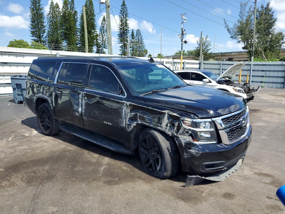 Photo 4 from auction – 2019 CHEVROLET SUBURBAN with VIN 1GNSCHKC0KR173481