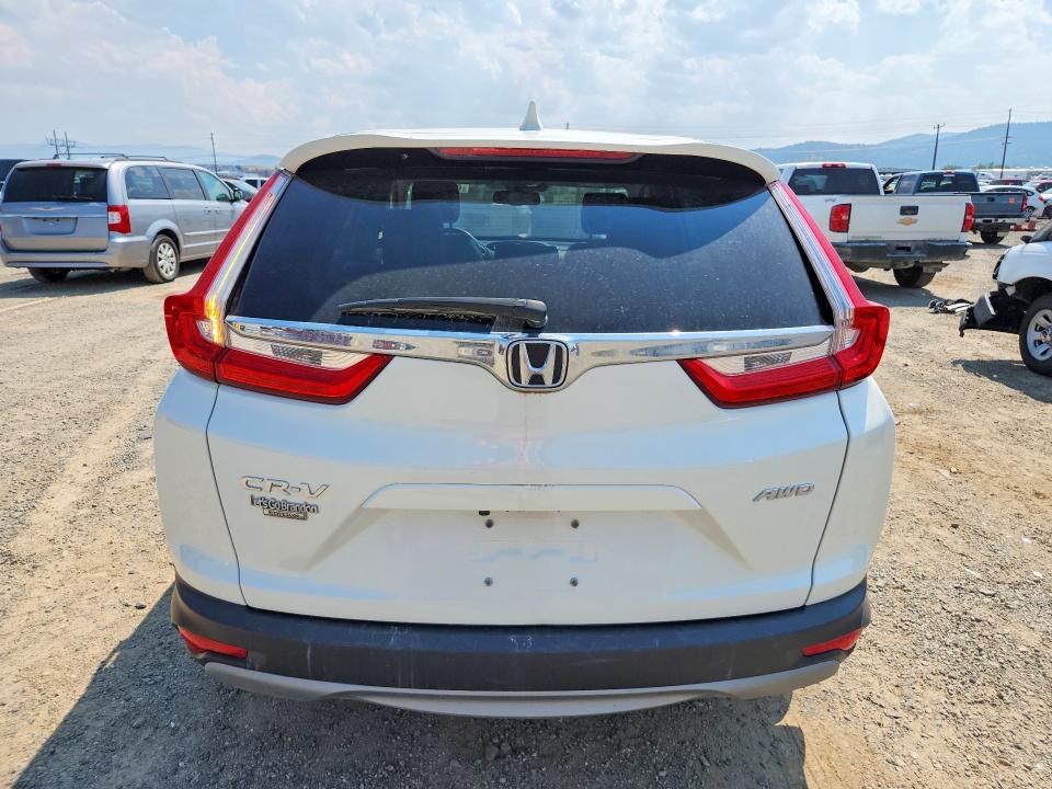 Photo 6 from auction – 2018 HONDA CR-V with VIN 2HKRW2H8XJH674589