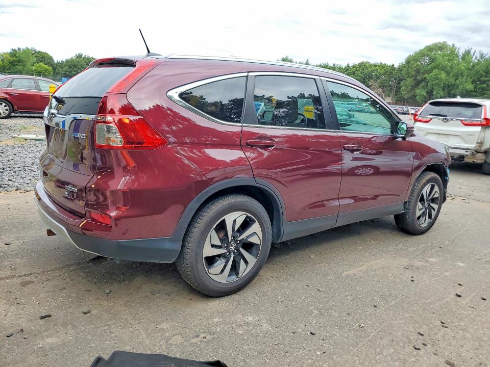 Photo 3 from auction – 2016 HONDA CR-V with VIN 5J6RM4H98GL106110