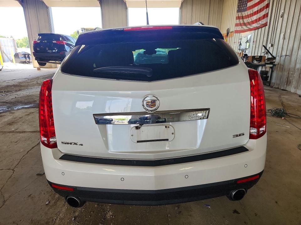 Photo 6 from auction – 2012 CADILLAC SRX with VIN 3GYFNDE31CS572370