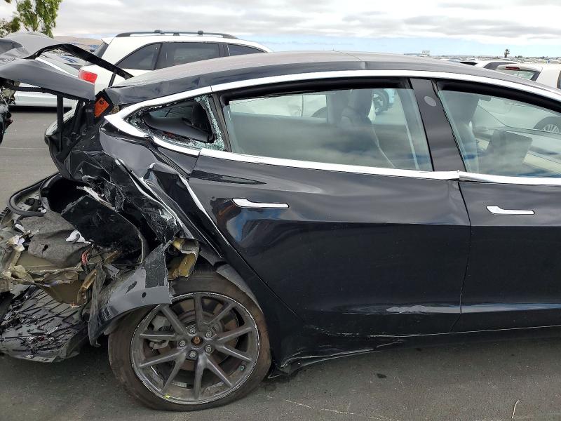 Photo 10 from auction – 2018 TESLA MODEL 3 with VIN 5YJ3E1EA8JF044109