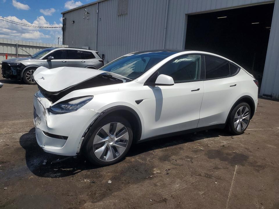 TESLA MODEL Y 2023 with VIN 7SAYGDEE2PA067656 - Photo from auction