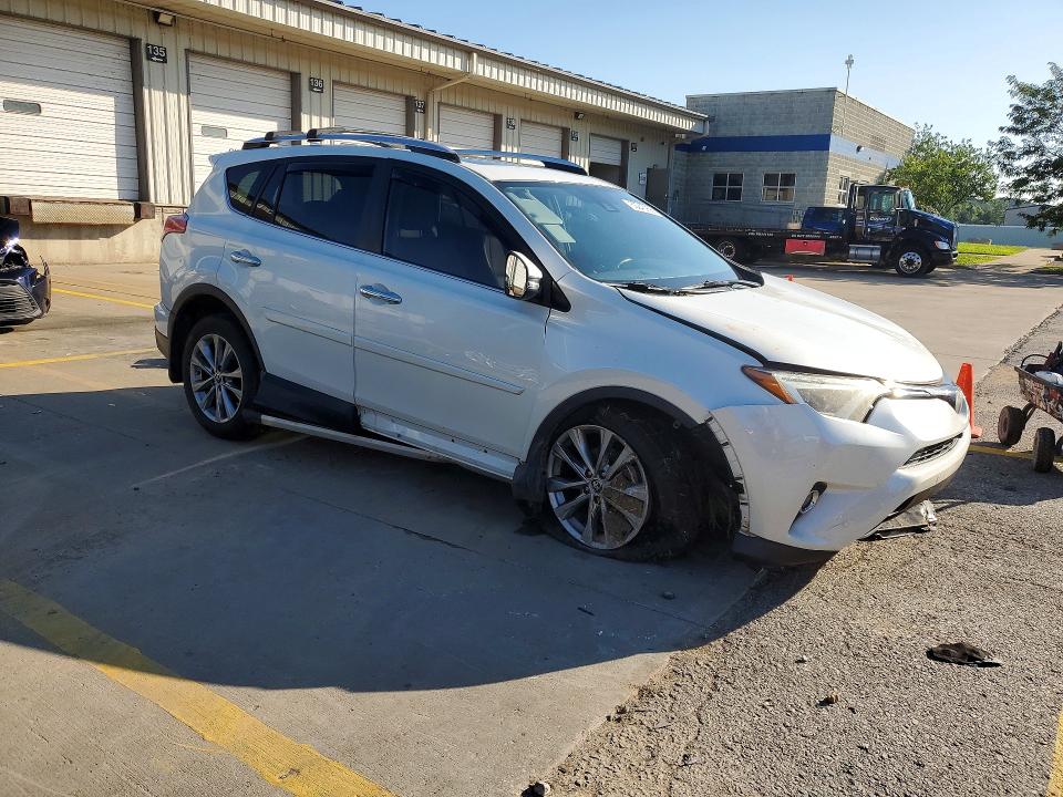 Photo 4 from auction – 2016 TOYOTA RAV4 with VIN JTMDFREV4GJ070663