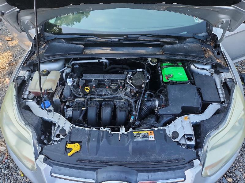 Photo 11 from auction – 2014 FORD FOCUS with VIN 1FADP3F20EL259817