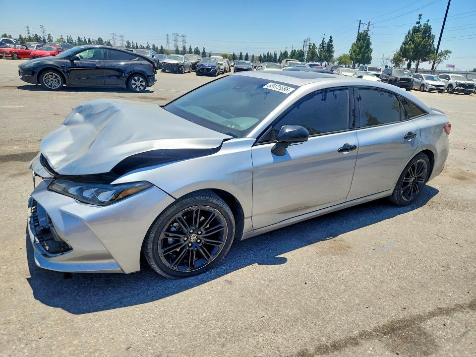 TOYOTA AVALON 2022 with VIN 4T1EA1AB5NU011239 - Photo from auction