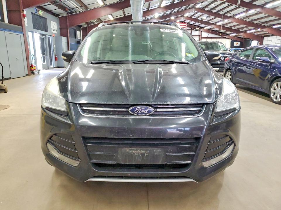 Photo 5 from auction – 2014 FORD ESCAPE with VIN 1FMCU9JX3EUD35203