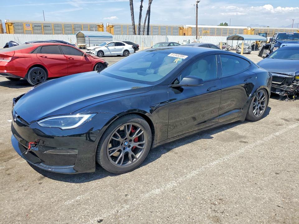 TESLA MODEL S 2023 with VIN 5YJSA1E61PF524665 - Photo from auction