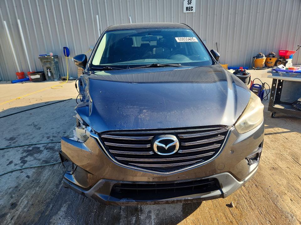 Photo 5 from auction – 2016 MAZDA CX-5 with VIN JM3KE4CY0G0667557