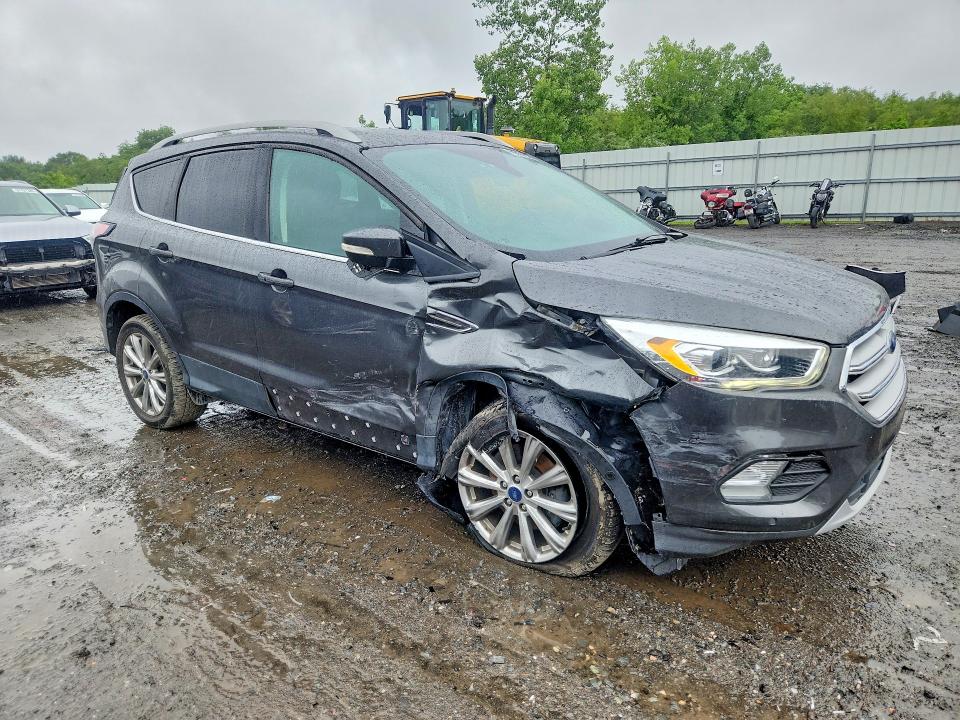 Photo 4 from auction – 2018 FORD ESCAPE with VIN 1FMCU0J94JUA44300