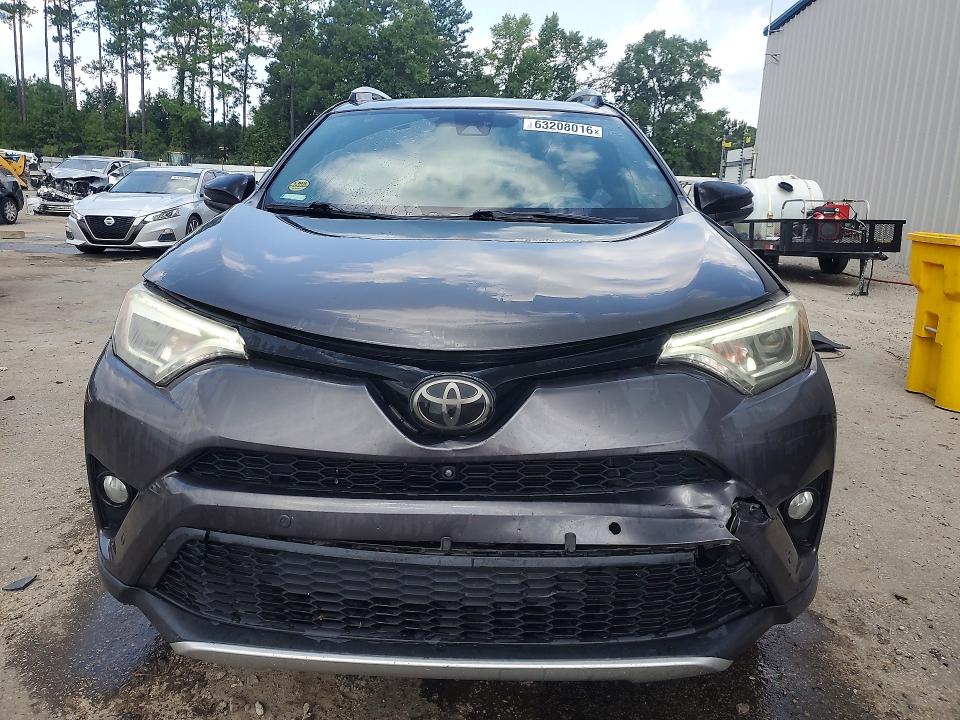 Photo 5 from auction – 2016 TOYOTA RAV4 with VIN 2T3NFREV2GW310010