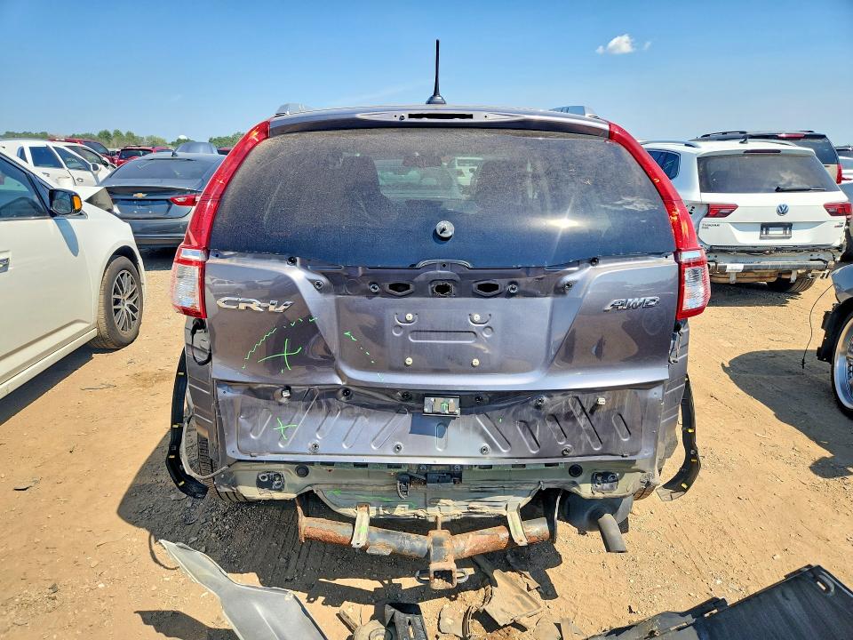Photo 6 from auction – 2015 HONDA CR-V with VIN 2HKRM4H74FH606885