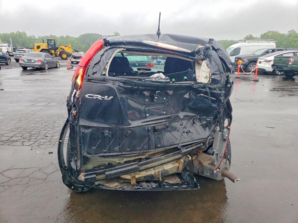Photo 6 from auction – 2014 HONDA CR-V with VIN 2HKRM4H35EH627434