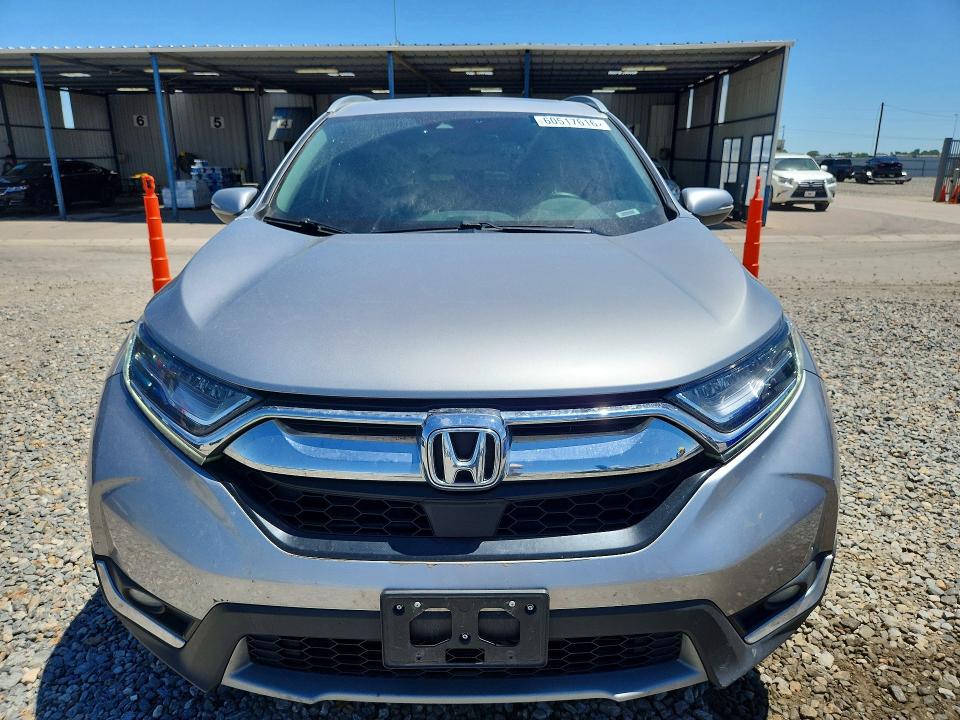Photo 5 from auction – 2017 HONDA CR-V with VIN 2HKRW2H94HH649853