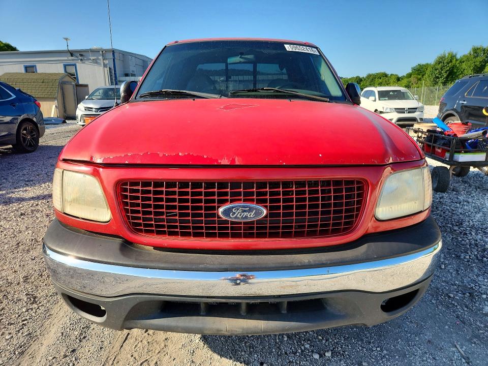 Photo 5 from auction – 2001 FORD F-150 with VIN 1FTRW07L51KD78620
