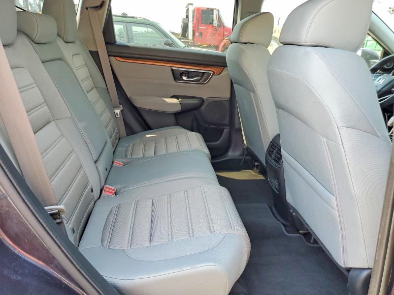Photo 11 from auction – 2018 HONDA CR-V with VIN 7FARW1H51JE040235