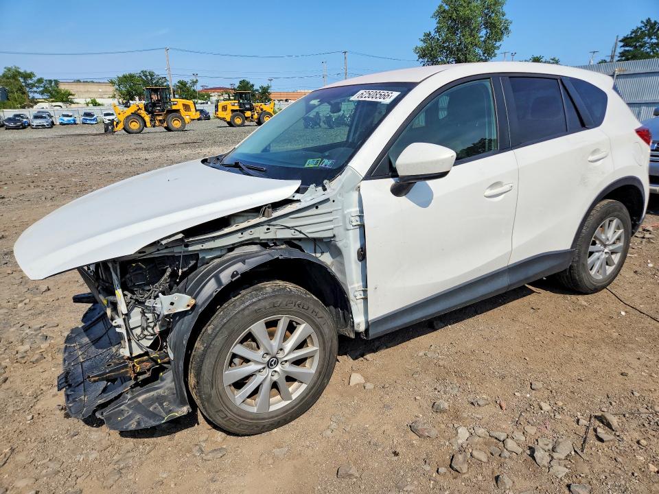 MAZDA CX-5 2014 with VIN JM3KE4CY8E0392971 - Photo from auction