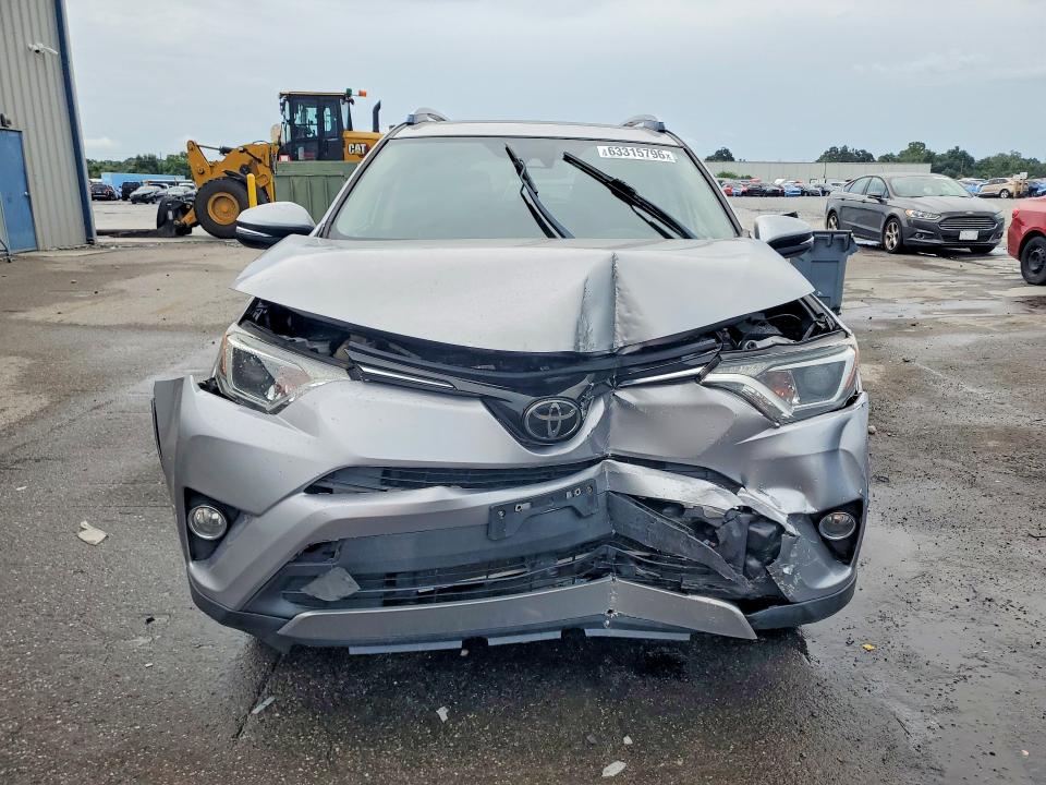 Photo 5 from auction – 2018 TOYOTA RAV4 with VIN JTMWFREV9JD112839