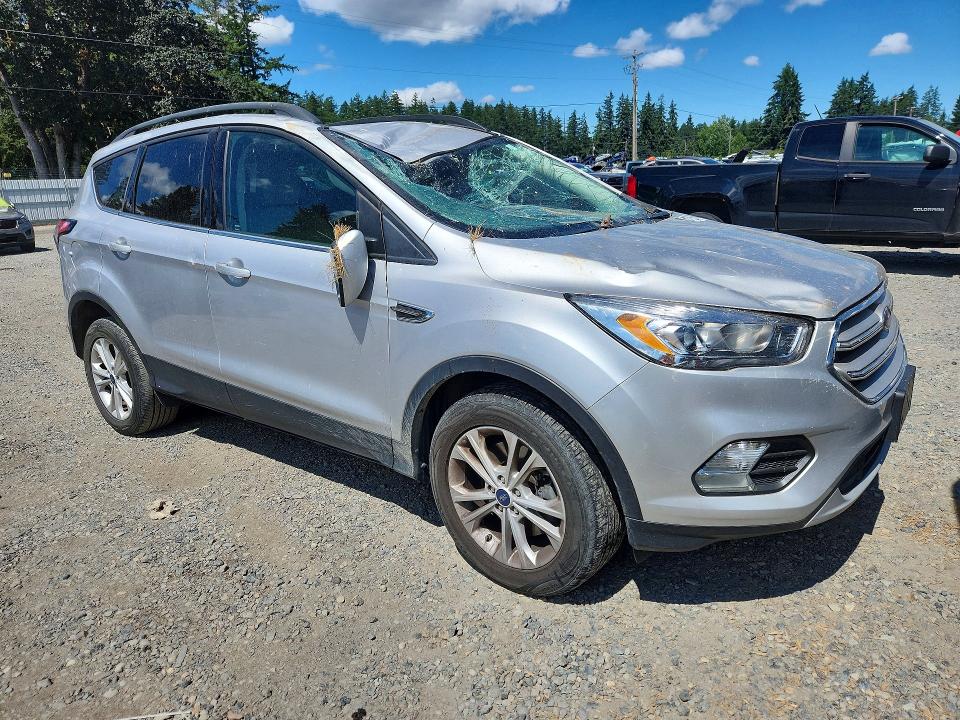 Photo 4 from auction – 2018 FORD ESCAPE with VIN 1FMCU9HD7JUC89459