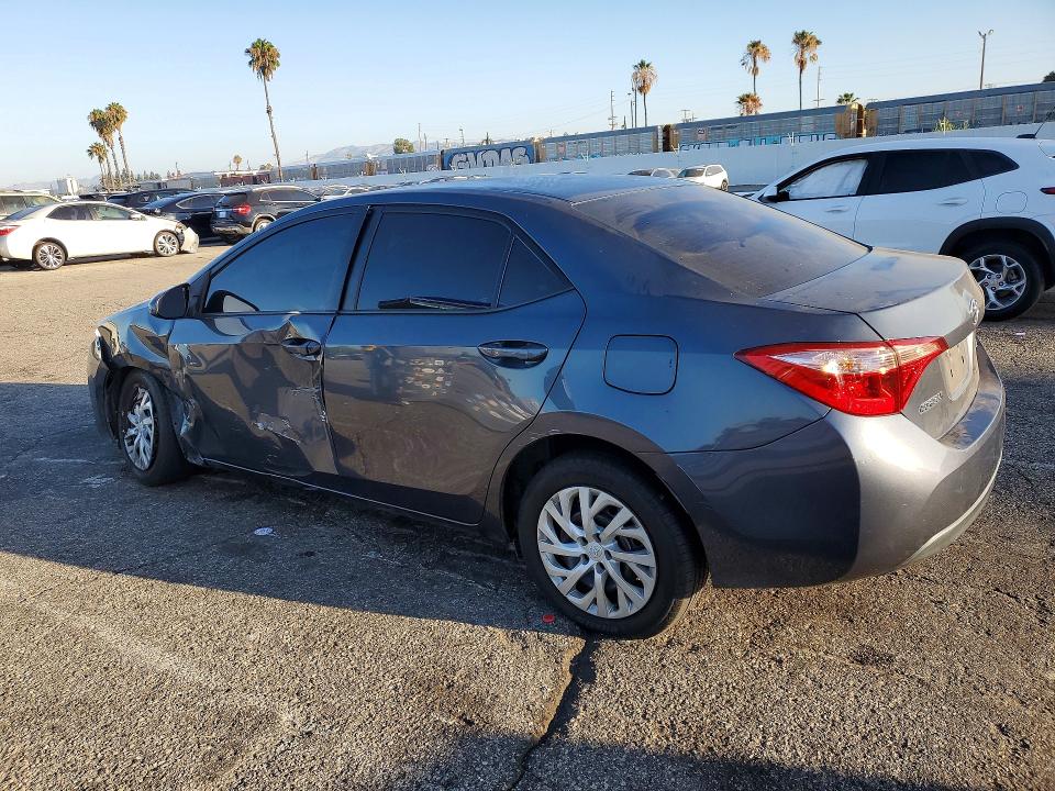 Photo 2 from auction – 2018 TOYOTA COROLLA with VIN 5YFBURHE5JP855429