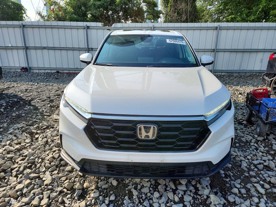 Photo 5 from auction – 2023 HONDA CR-V with VIN 2HKRS4H45PH409379