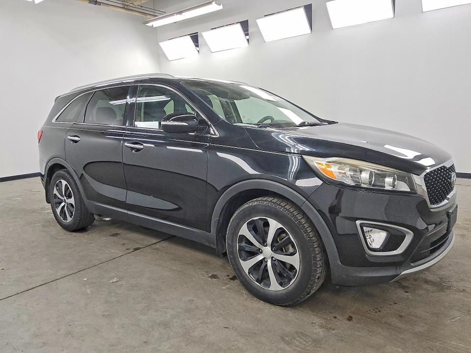 Photo 4 from auction – 2016 KIA SORENTO with VIN 5XYPH4A17GG019039