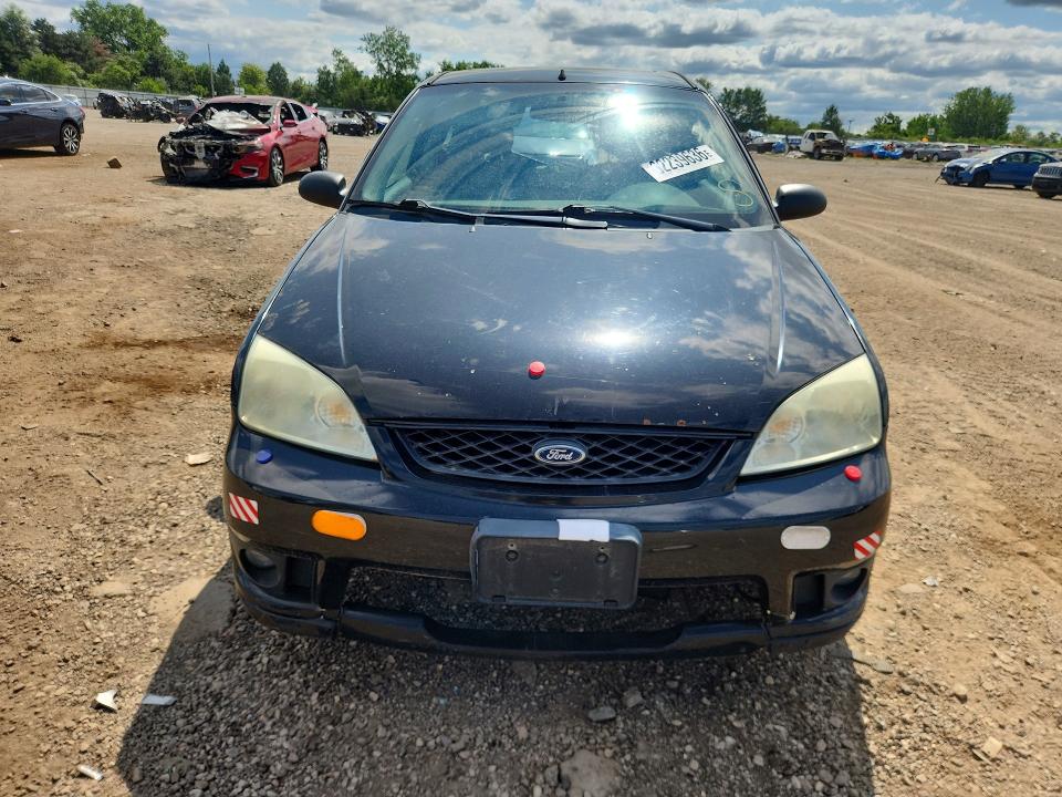 Photo 5 from auction – 2006 FORD FOCUS with VIN 1FAFP31N56W218223