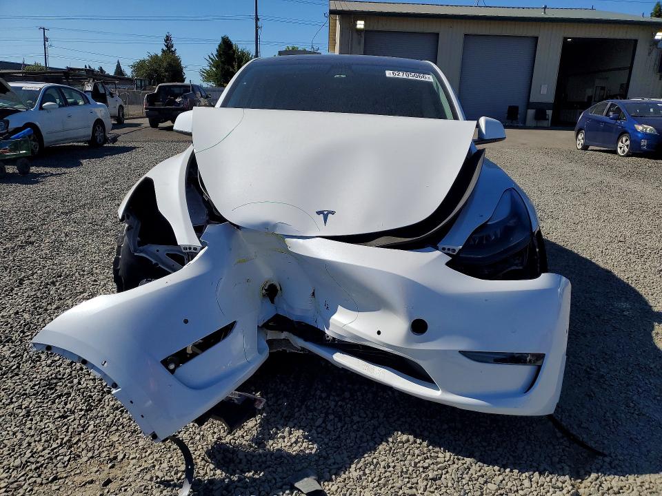 Photo 5 from auction – 2022 TESLA MODEL Y with VIN 7SAYGDEF2NF446701