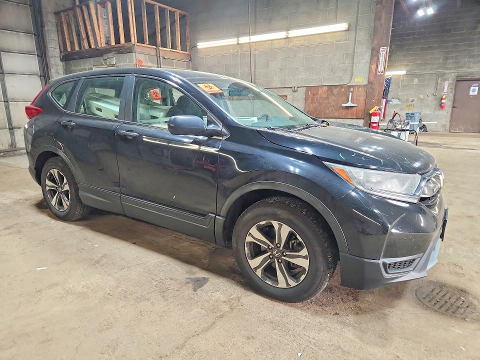 Photo 4 from auction – 2017 HONDA CR-V with VIN 5J6RW6H37HL007409