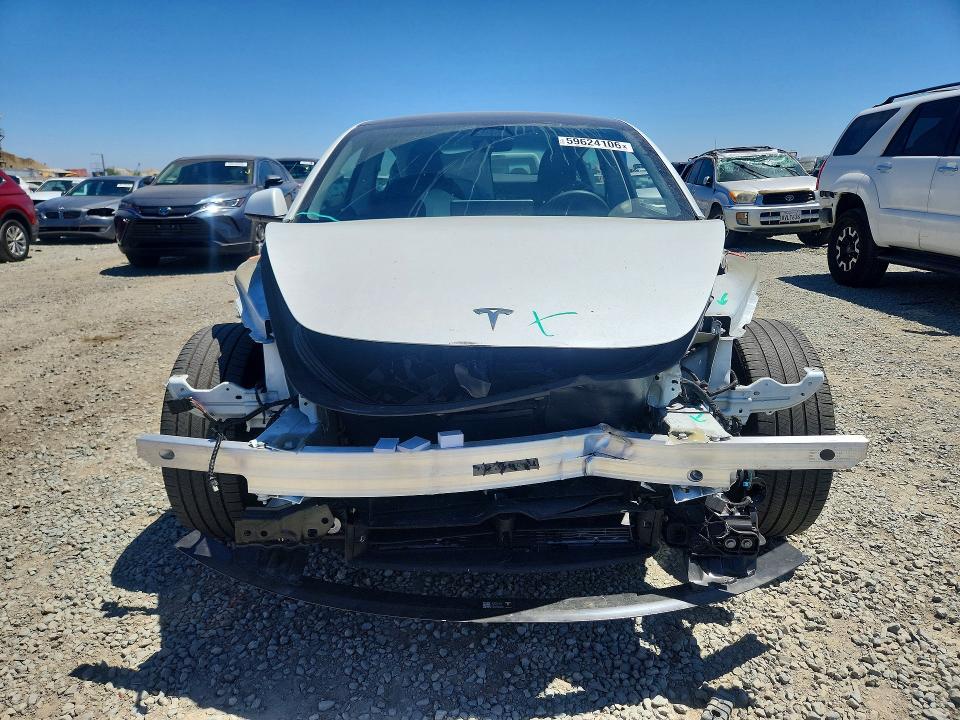 Photo 5 from auction – 2023 TESLA MODEL 3 with VIN 5YJ3E1EA5PF605469