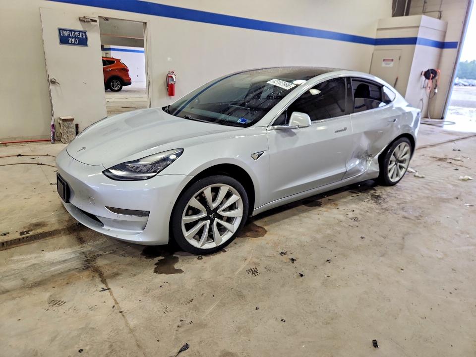 TESLA MODEL 3 2018 with VIN 5YJ3E1EA8JF017850 - Photo from auction