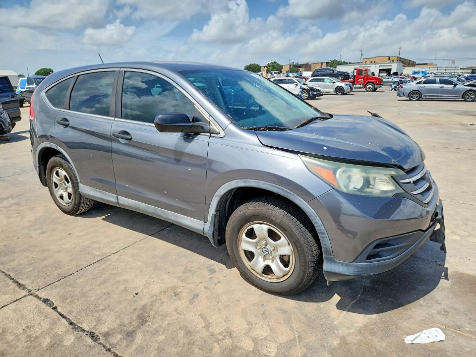 Photo 4 from auction – 2014 HONDA CR-V with VIN 3CZRM3H38EG715939