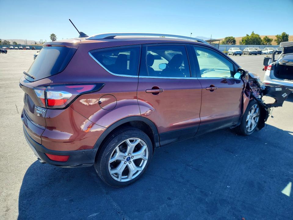 Photo 3 from auction – 2018 FORD ESCAPE with VIN 1FMCU9J97JUA56994