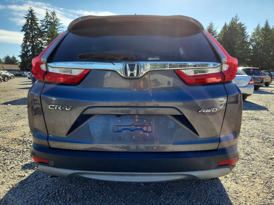 Photo 6 from auction – 2017 HONDA CR-V with VIN 2HKRW2H56HH615264
