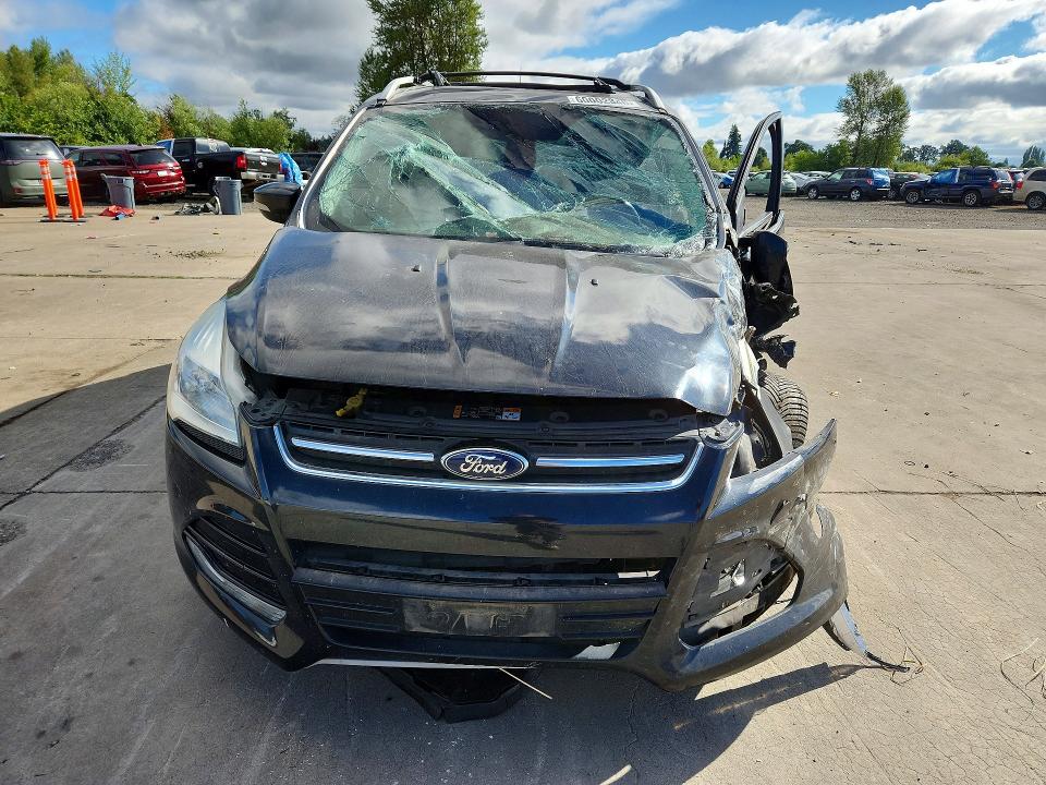 Photo 5 from auction – 2014 FORD ESCAPE with VIN 1FMCU9JX6EUB32516