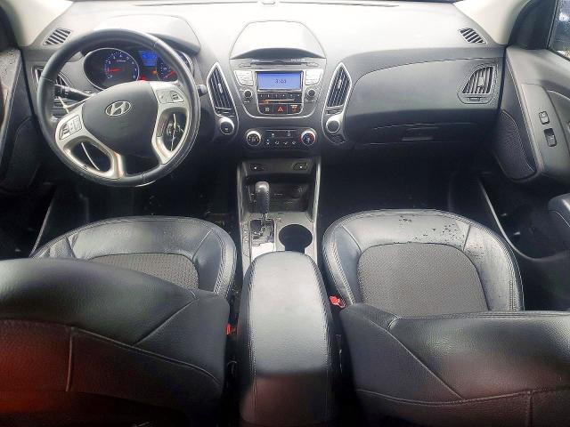 Photo 8 from auction – 2012 HYUNDAI TUCSON with VIN KM8JUCAC8CU371872