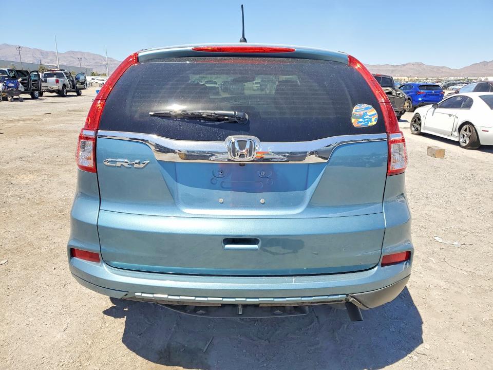 Photo 6 from auction – 2015 HONDA CR-V with VIN 2HKRM3H56FH545693