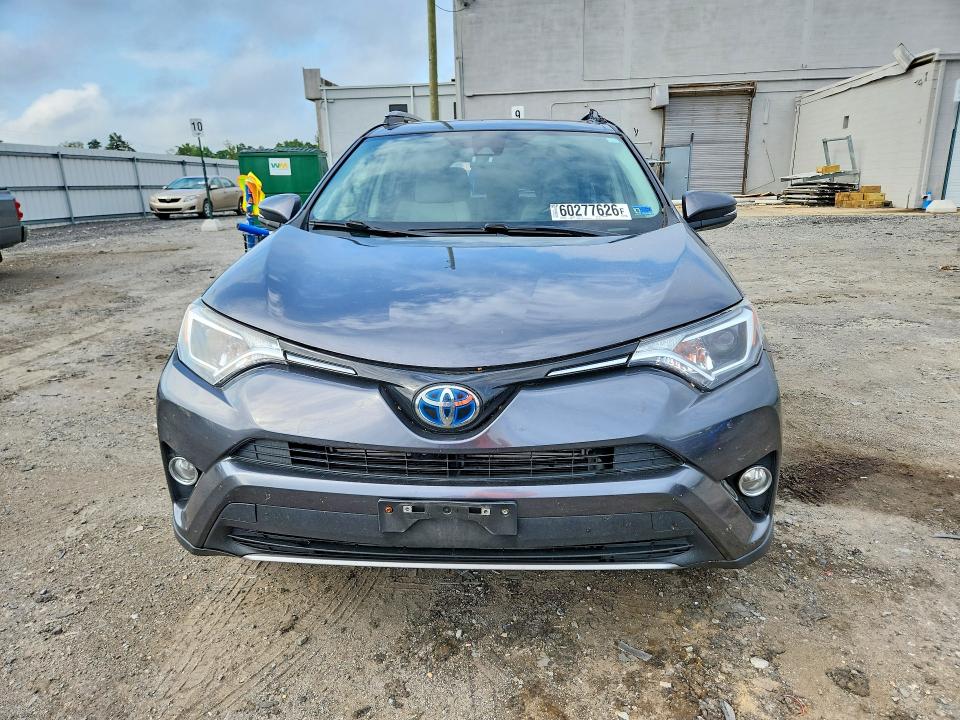 Photo 5 from auction – 2017 TOYOTA RAV4 HYBRID with VIN JTMRJREV4HD089752