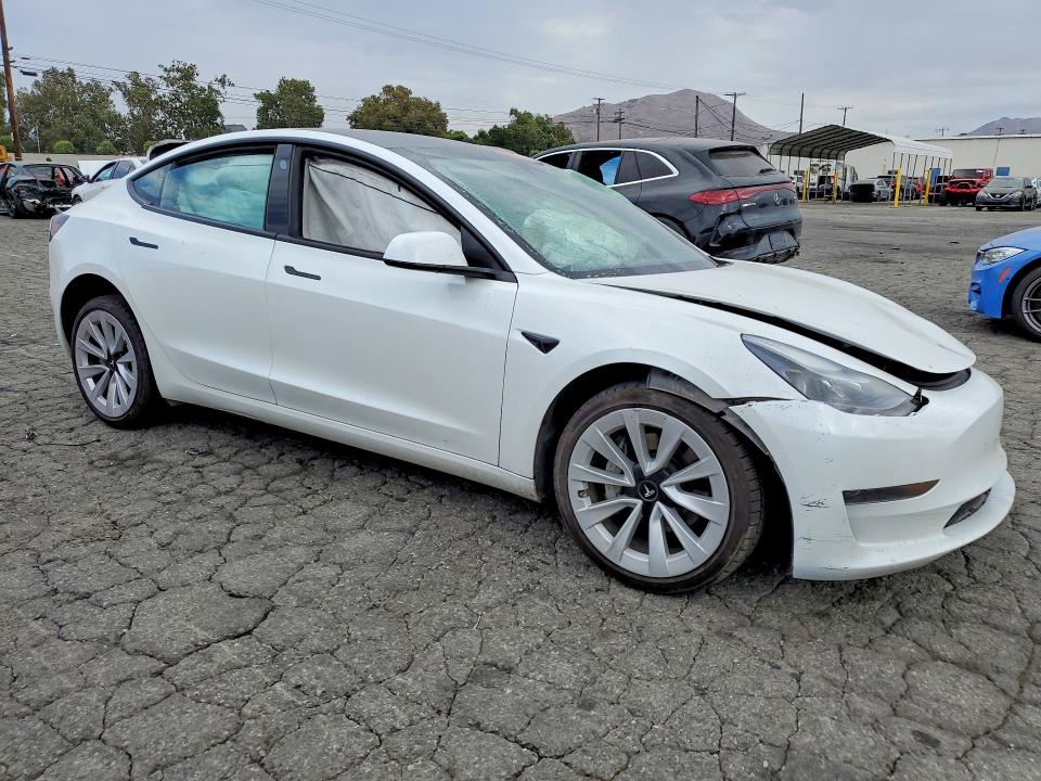Photo 4 from auction – 2023 TESLA MODEL 3 with VIN 5YJ3E1EA7PF599996